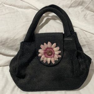 Cheater black straw like handbag pinkish purple flower euc